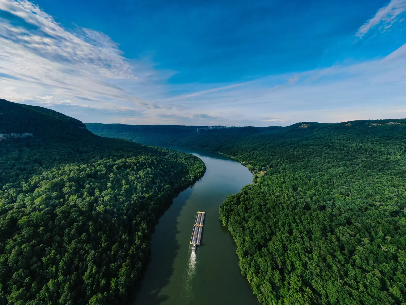 Barge on the Tennessee River near Chattanooga — river frontage and bluff land