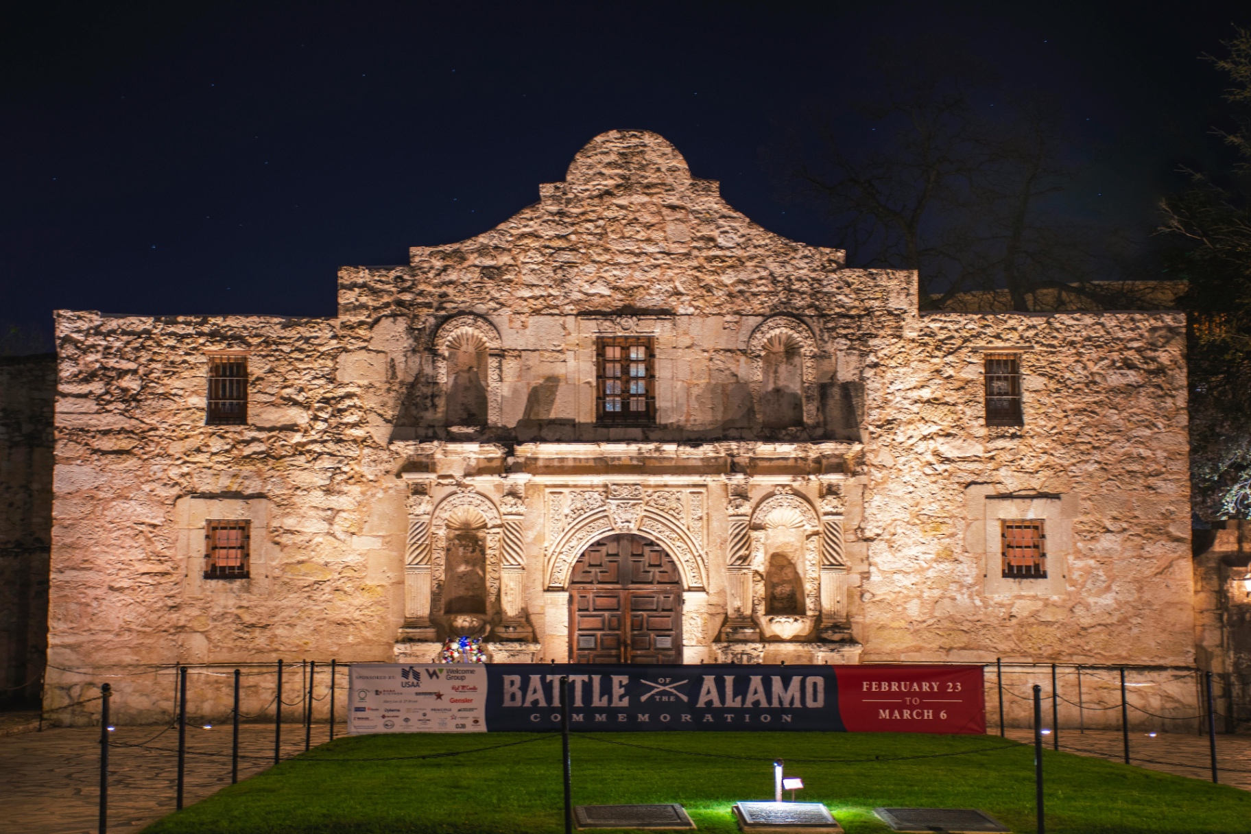 The Alamo illuminated at night, just minutes from Dignowity Hill